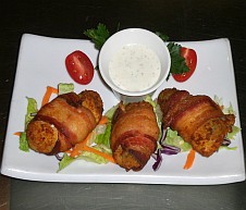 Jalapeno poppers stuffed with cream cheese bacon wrapped