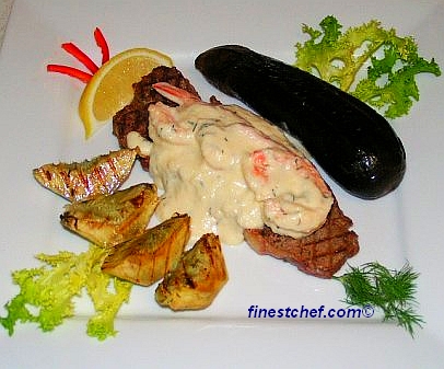 Grilled steak with shrimp and gorgonzola sauce